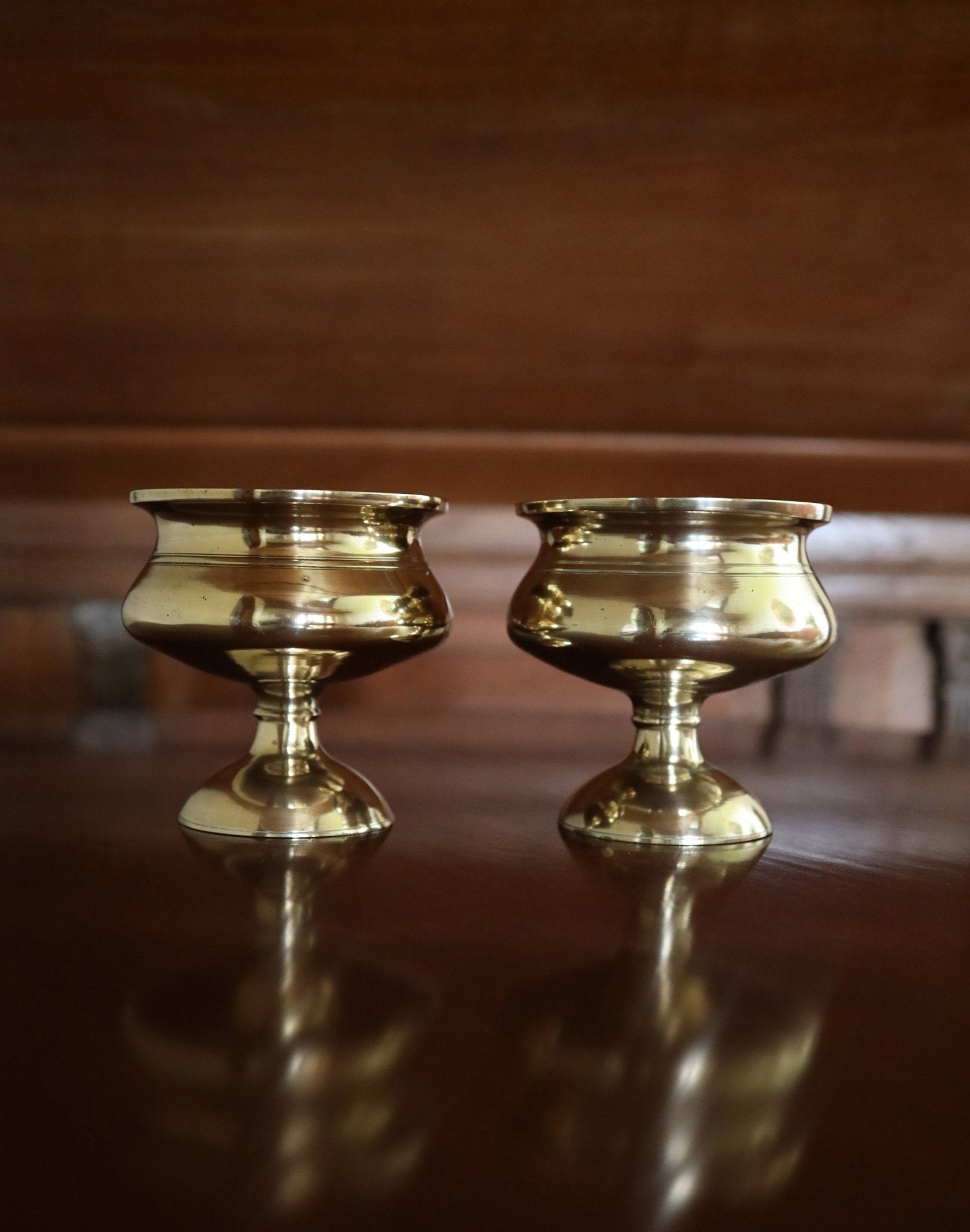 A pair of brass pedestal bowls - Clementine Parker