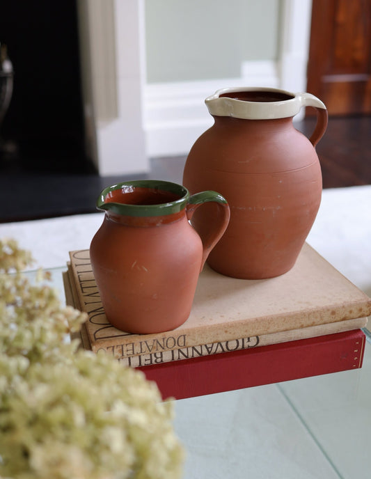 Two terracotta Royal Barum Ware jugs - Clementine Parker